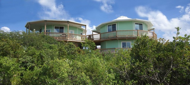 Layin' Low includes one golf cart/villa with water views in Staniel Cay