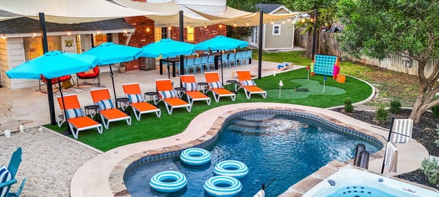 Resort Style Backyard Pool Putt Putt Hot Tub in San Antonio